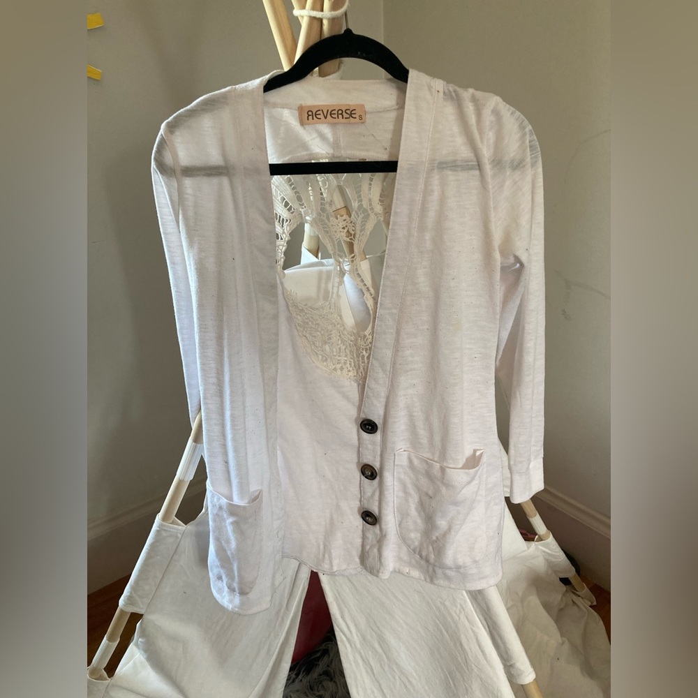 Cute white Reverse cardigan with crocheted skull on the back